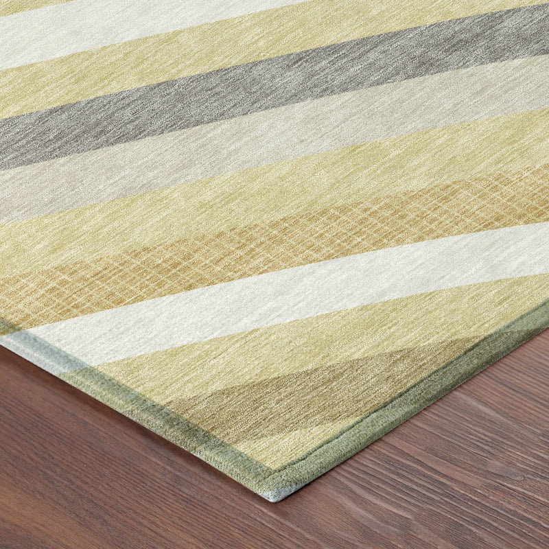 Rectangular area rug corner detail with abstract pattern in wheat, gold, gray, and white.