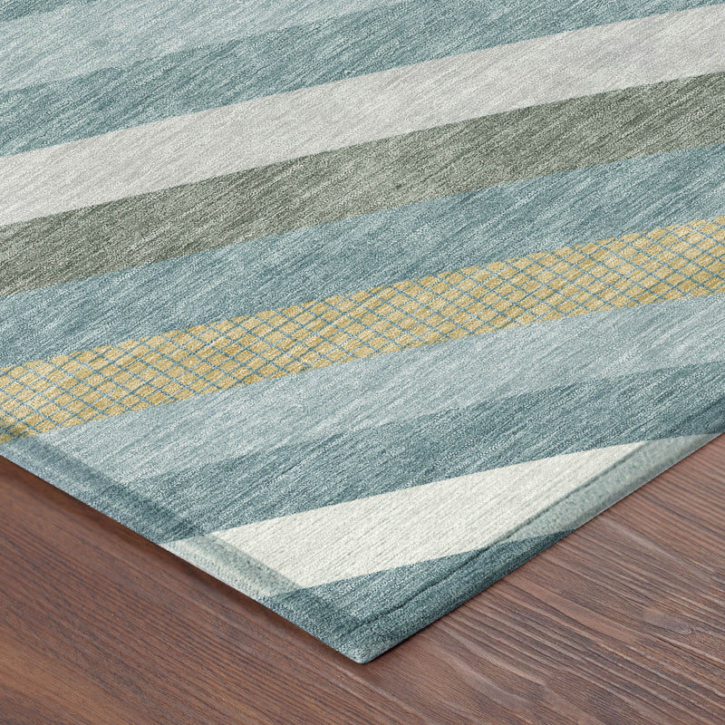 Teal blue area rug with white border bands and gold grid accent stripe