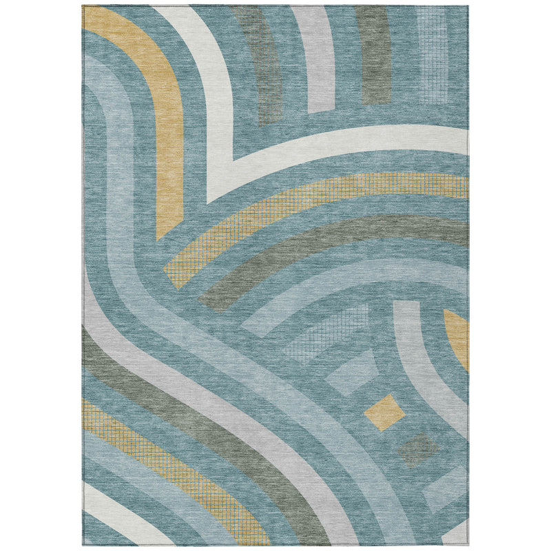 Teal blue abstract area rug with white waves and gold dotted accent lines