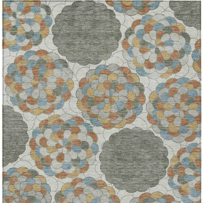 Floral area rug with repeating gray medallions and multicolor flower motifs