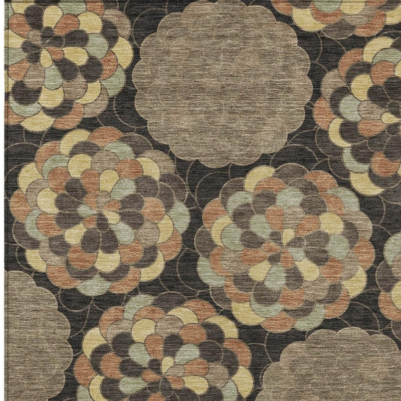 Brown and beige floral area rug with medallion shapes on dark ground, textured pile
