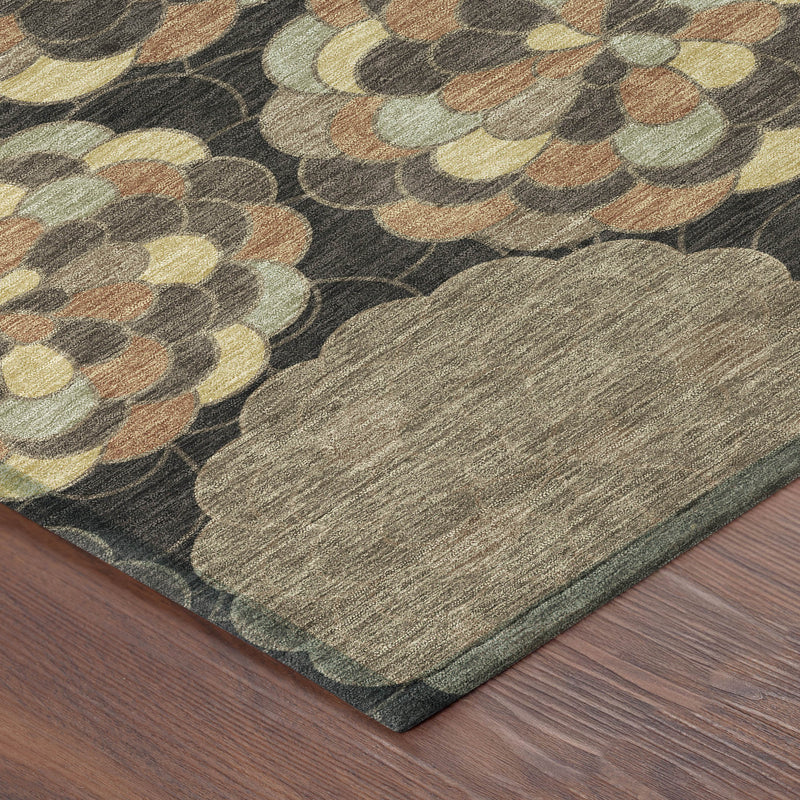 Corner of brown and beige floral area rug with dark border, textured low-pile weave