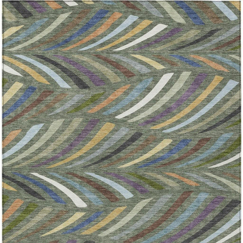 Abstract area rug surface with multicolor curved stripe pattern on gray-green background
