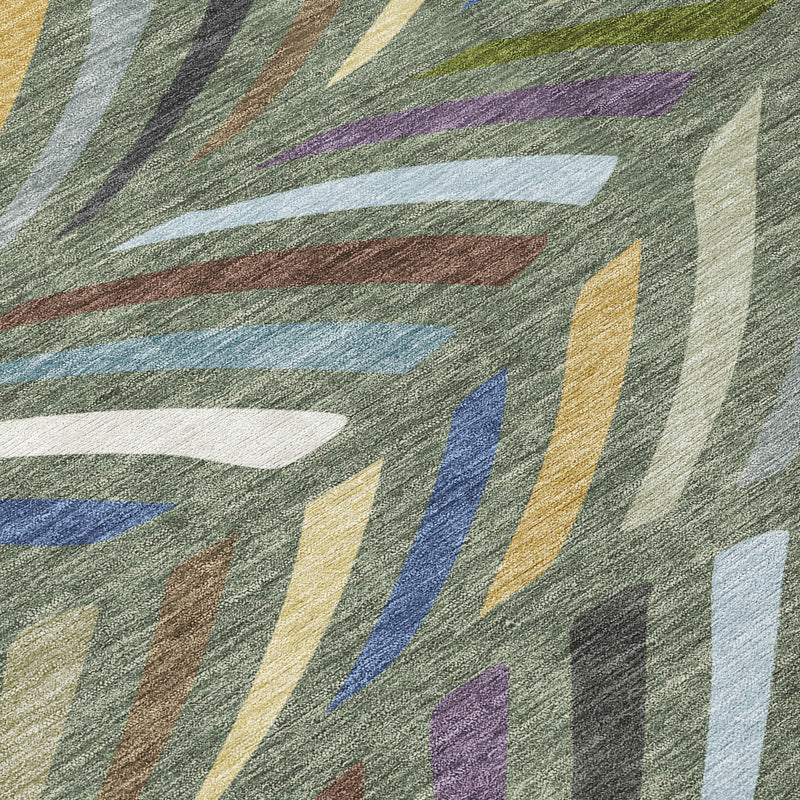 Abstract area rug texture detail with rainbow stripe pattern on muted green-gray