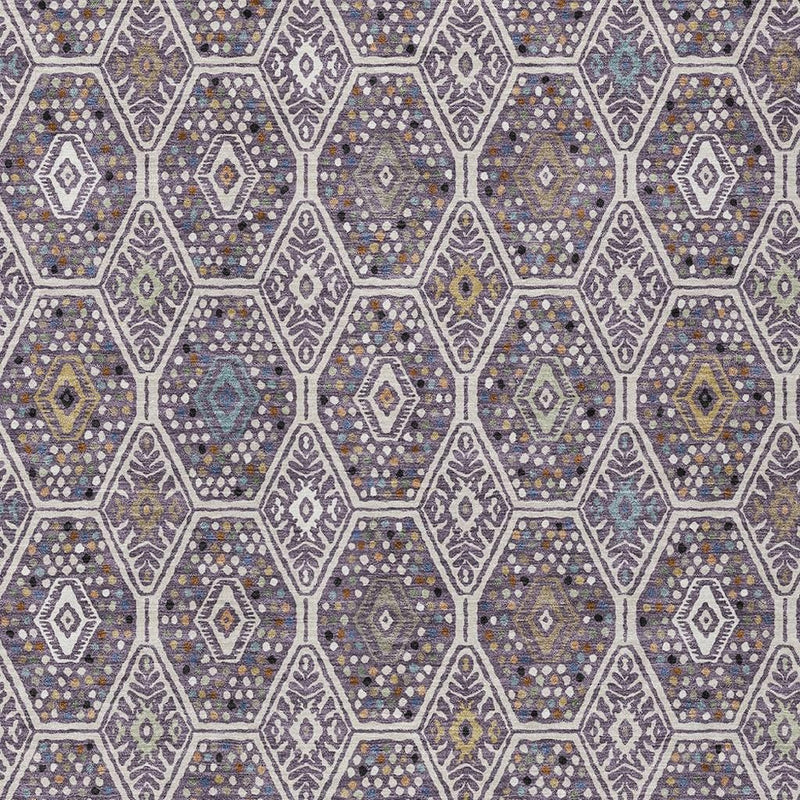 Geometric area rug with repeating lavender and blue hexagons and small diamond accents