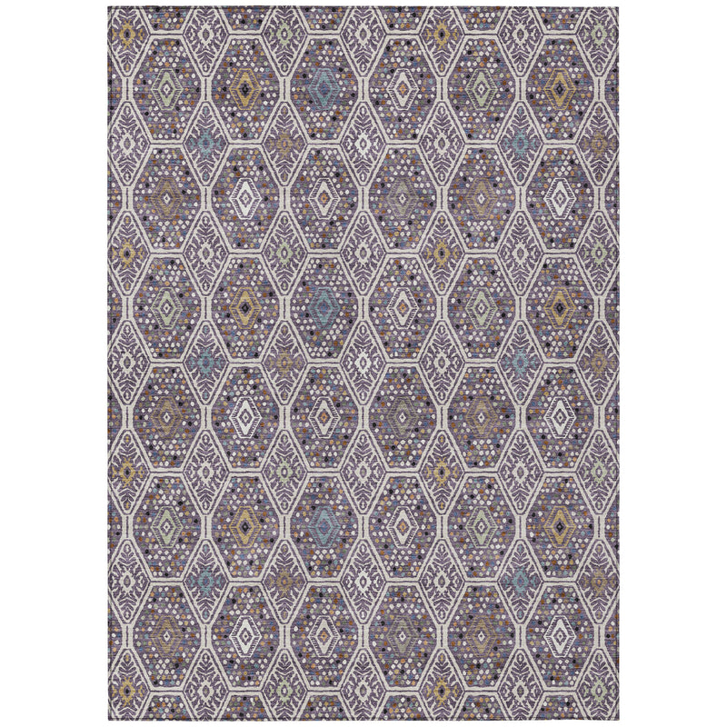 Rectangular geometric area rug in purple and blue with repeating hexagon motifs