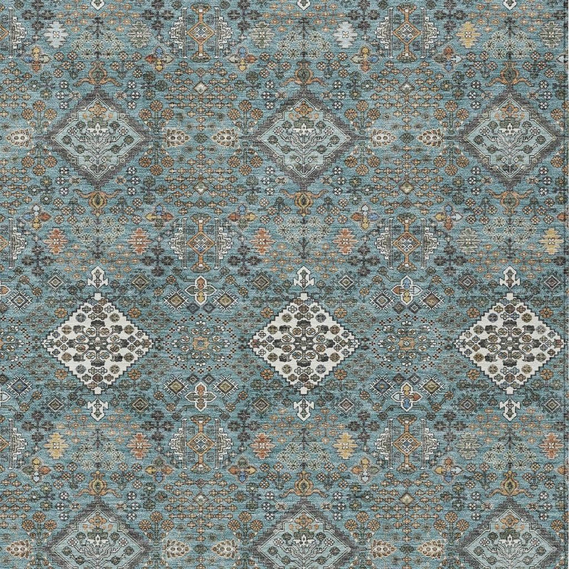 Teal blue geometric area rug pattern with repeating ivory diamond medallions