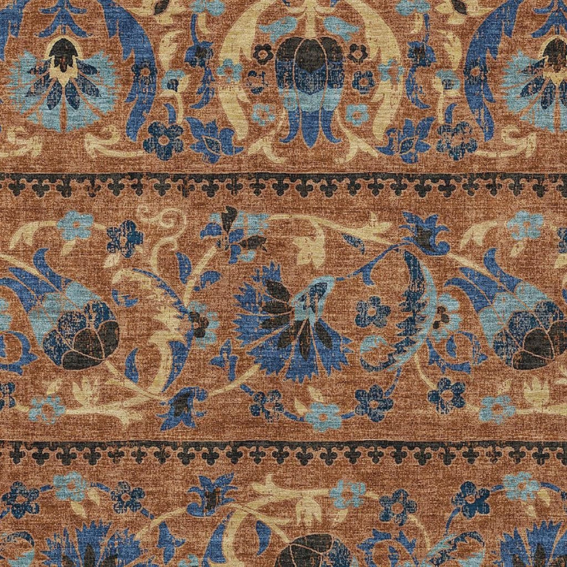 Indoor outdoor area rug close-up, blue floral motifs on tan ground