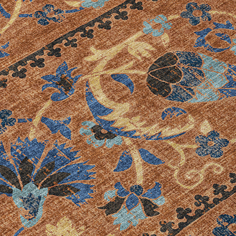 Indoor outdoor area rug texture close-up, tan and blue floral motifs and pattern