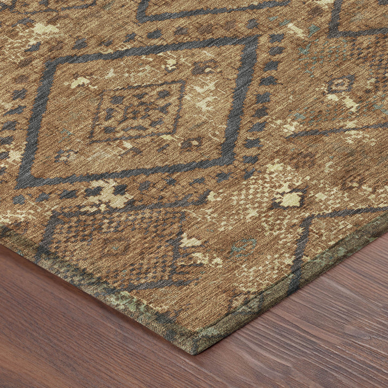 Orange and gold area rug corner with blue diamond motifs and border lines