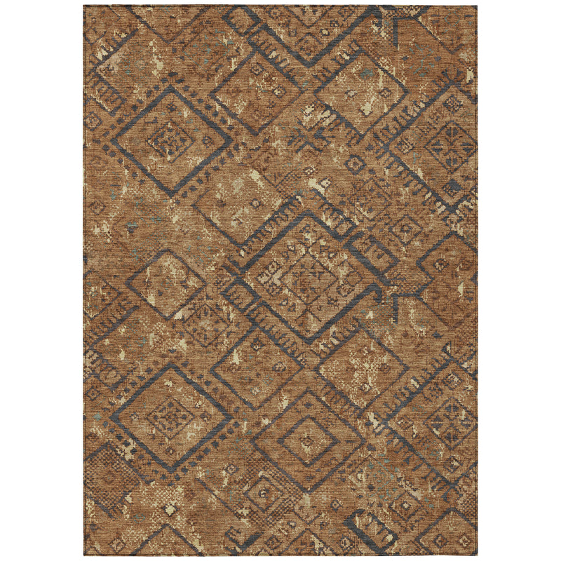 Rectangular area rug in orange and gold with navy geometric diamond pattern