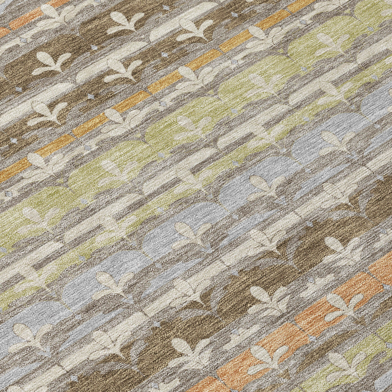 Damask rug close-up showing small fleur-de-lis pattern lines in gray, beige, and olive tones.
