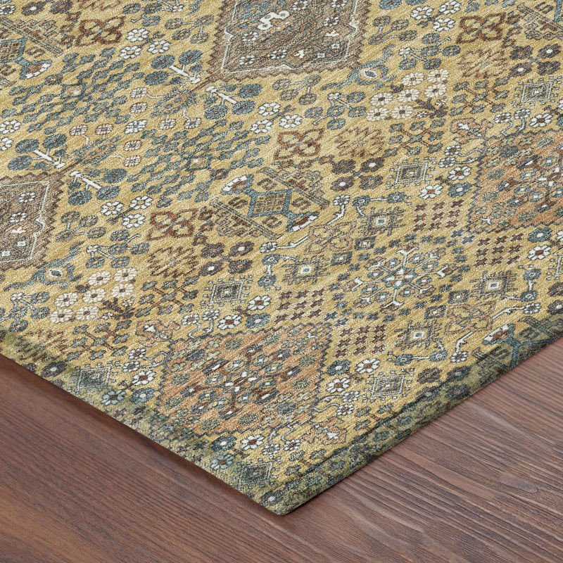 Corner view of geometric rug with gold, teal, blue, and cream motifs