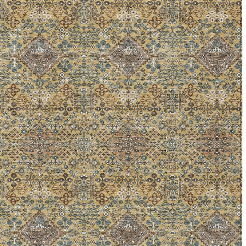 Geometric area rug with diamond medallion motifs in gold, blue, and copper tones