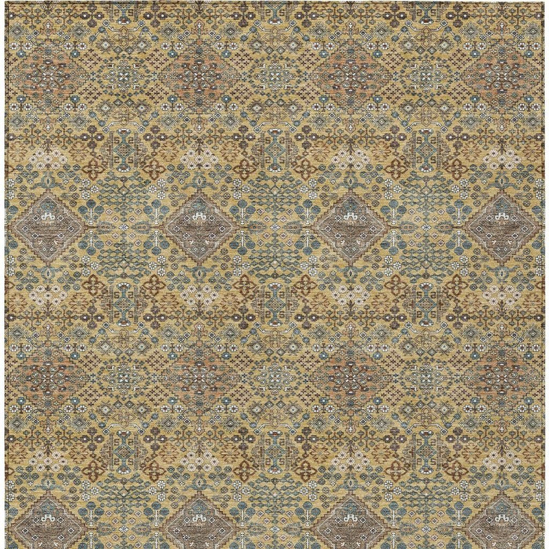 Pattern view of geometric rug with gold and copper base, blue and cream accents