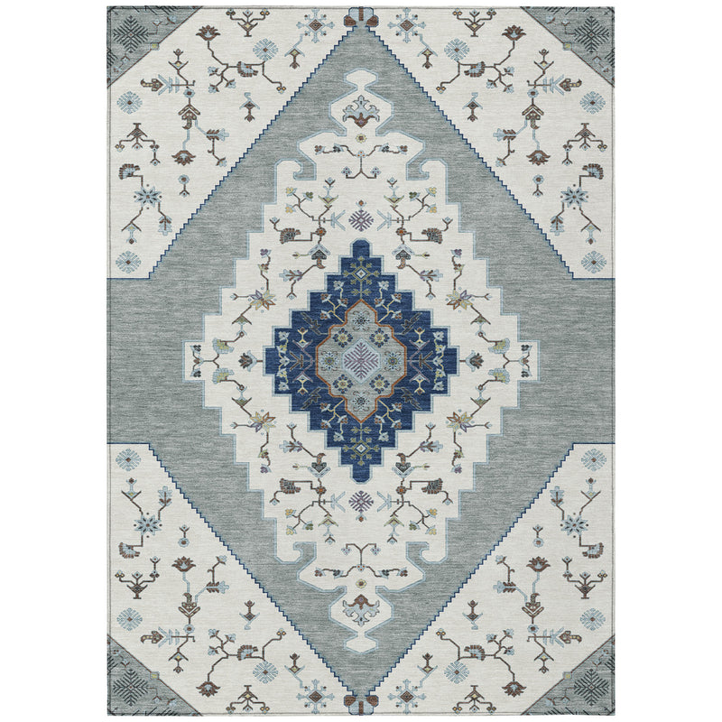 Ivory and silver geometric wash rug with blue center diamond pattern