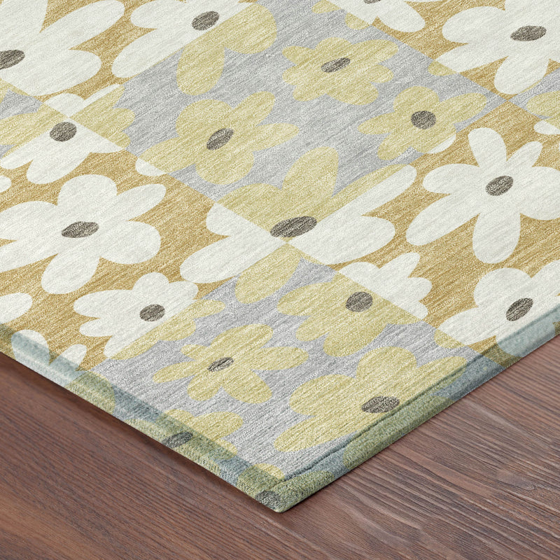 Floral area rug corner detail with gold and ivory blossoms on gray ground