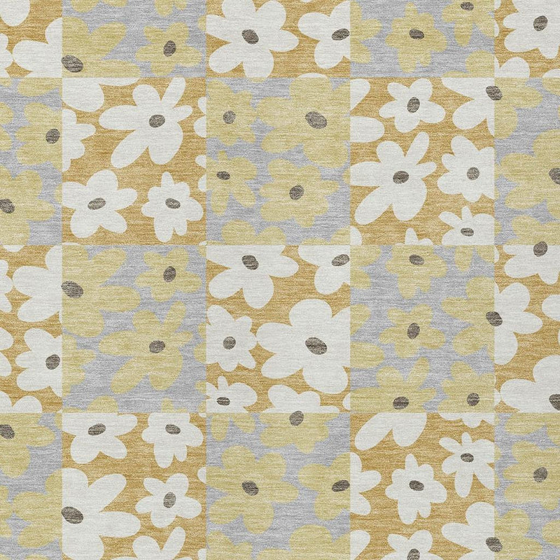 Floral patchwork area rug with gold, ivory, and gray blocks and small dot accents