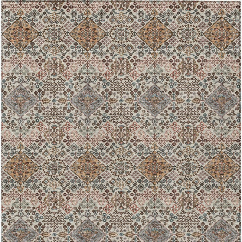 Beige geometric area rug with repeating diamond medallions in copper, blue, and rust tones