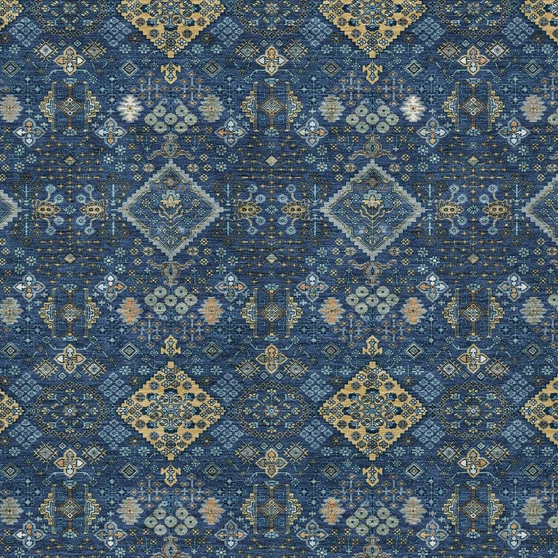 Navy blue and gold geometric area rug close-up with diamond motifs