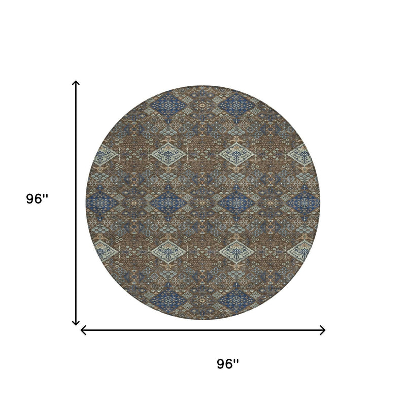 96-inch round area rug with repeating geometric pattern in brown, blue, and cream