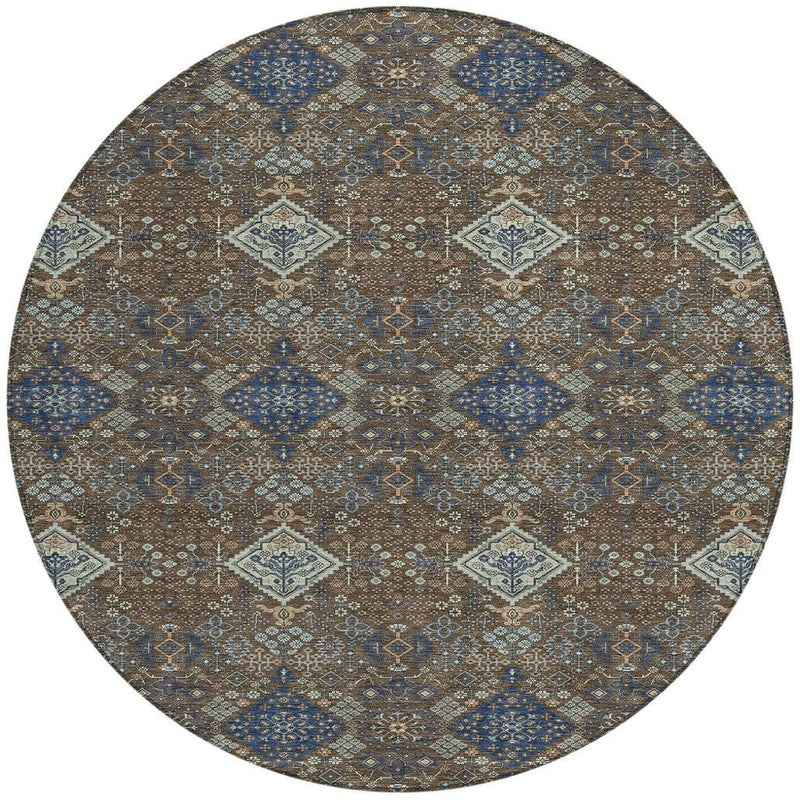 Round area rug featuring diamond and medallion motifs in brown, blue, and cream