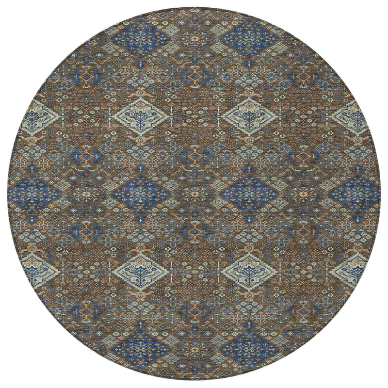 Round area rug with centered medallion design and repeating geometric shapes, brown and blue