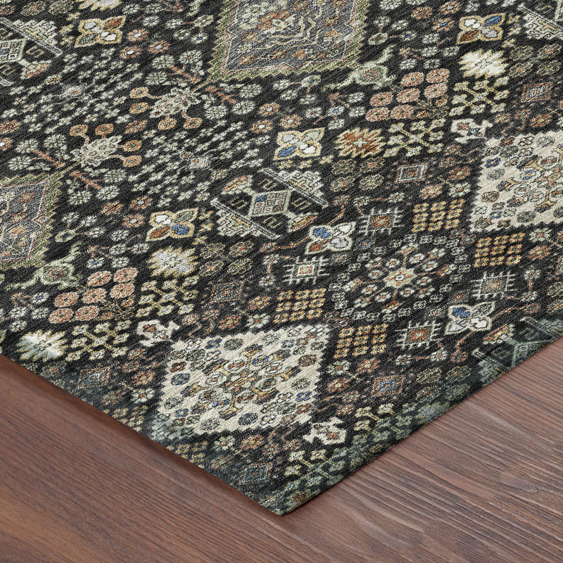 Corner of dark charcoal geometric rug with multicolor pattern and flat woven texture