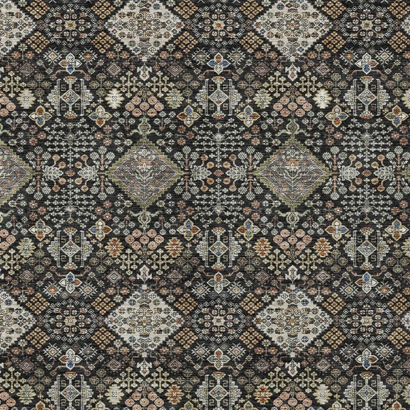 Charcoal and black geometric rug with repeating diamonds and small ornamental details