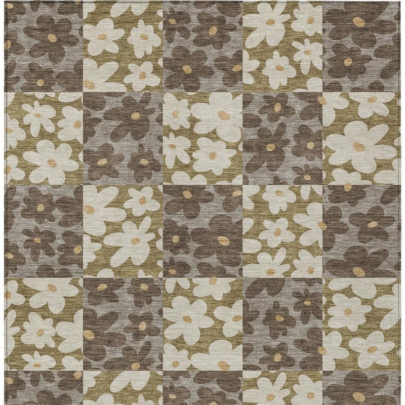Floral patchwork area rug in gray-brown with cream and tan flower blocks