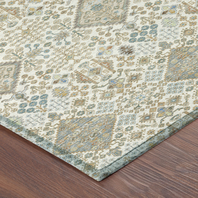 Corner of round area rug with ivory geometric pattern and teal and copper accents