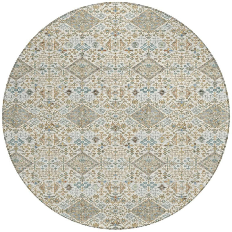 Round area rug with light ivory background and blue-green geometric pattern, full view
