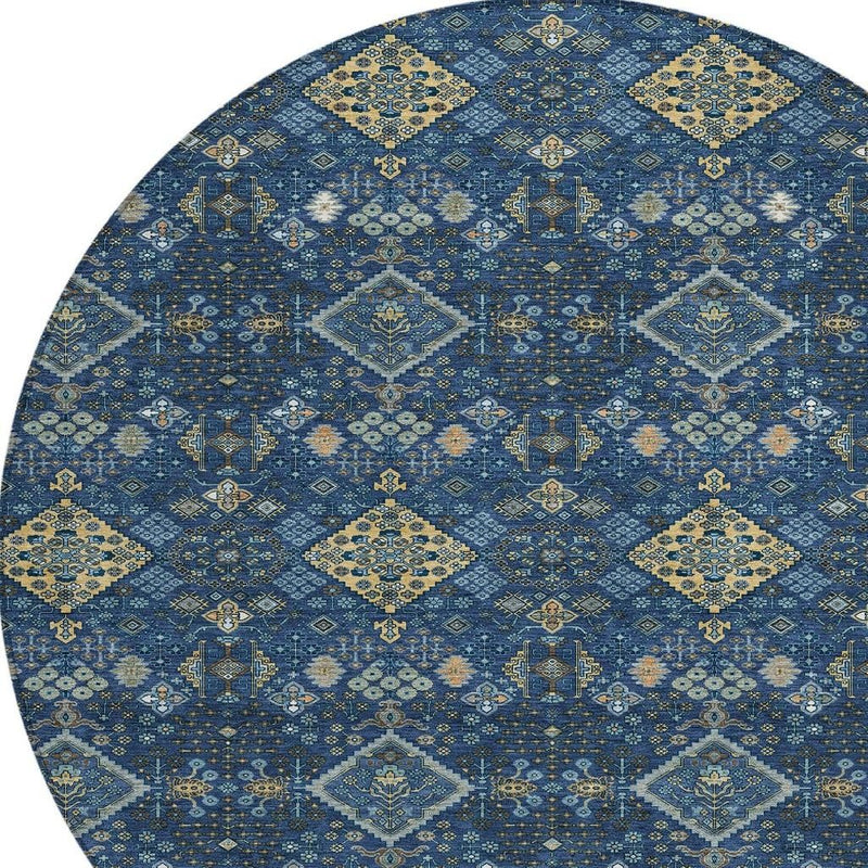 Navy blue and gold round geometric area rug with symmetrical diamond motifs.