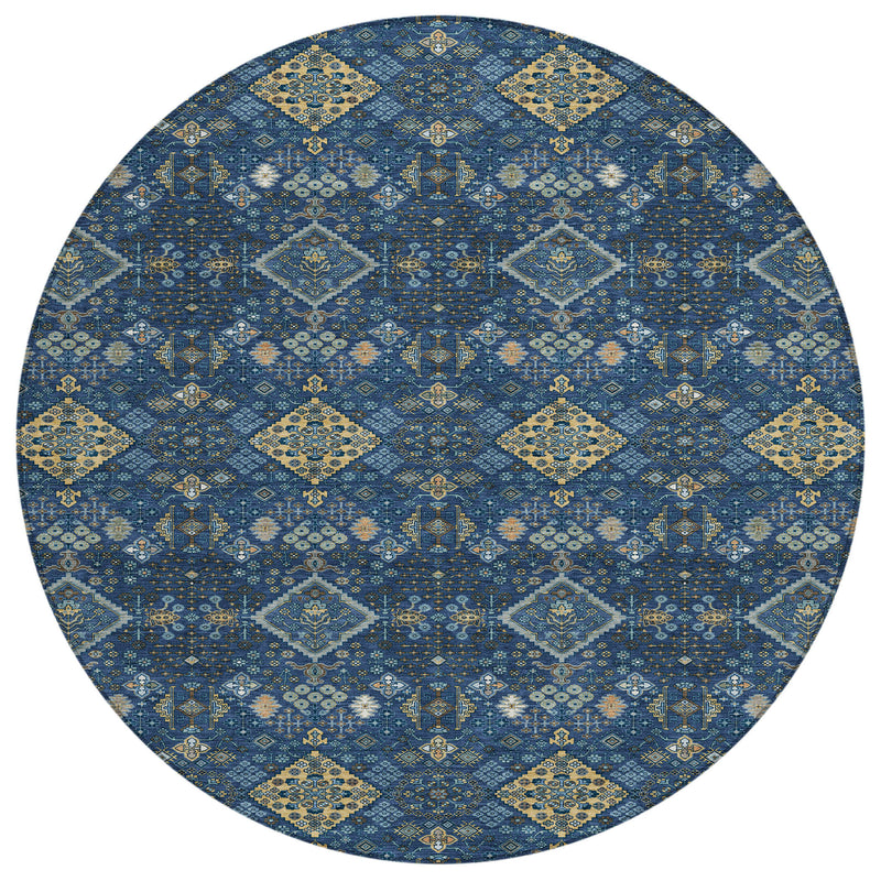 Navy blue and gold round geometric washable area rug with repeating medallion blocks.