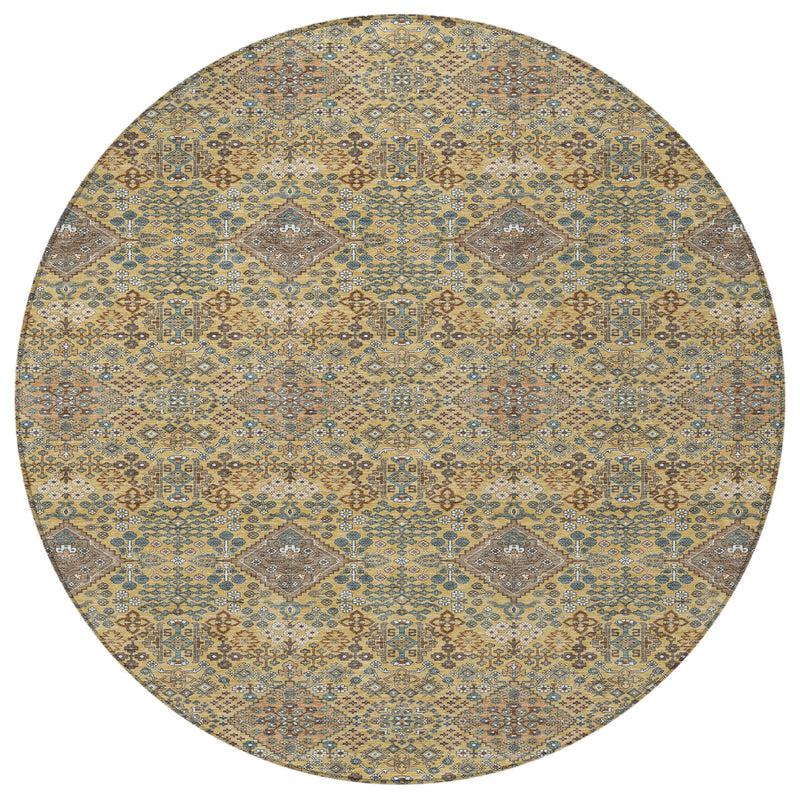 Round area rug with geometric pattern in gold, copper, and blue tones