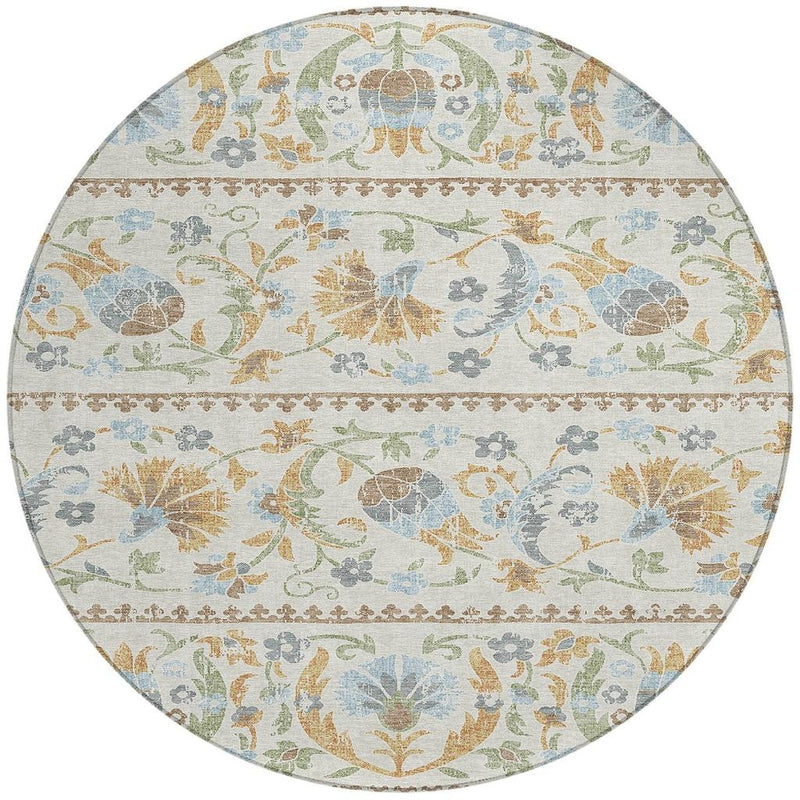 Full round area rug with ivory background and light blue, green, and beige botanical pattern
