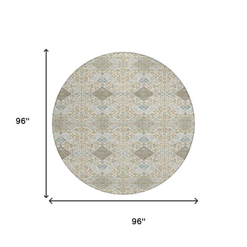 Round area rug, ivory and teal geometric pattern, 96 in x 96 in