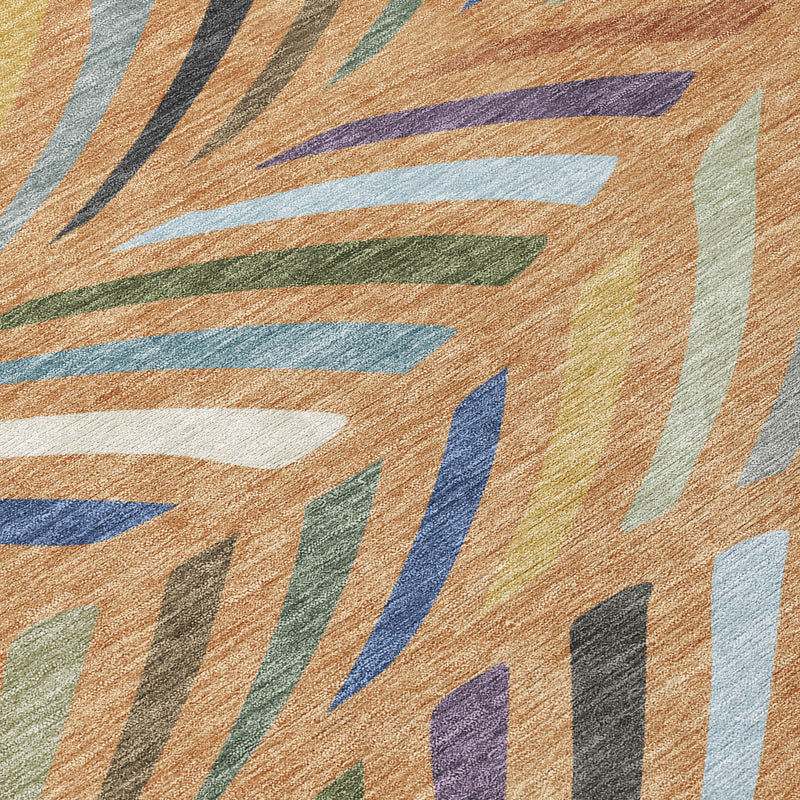 Rug detail showing abstract stripes in orange-brown, blue, green and purple