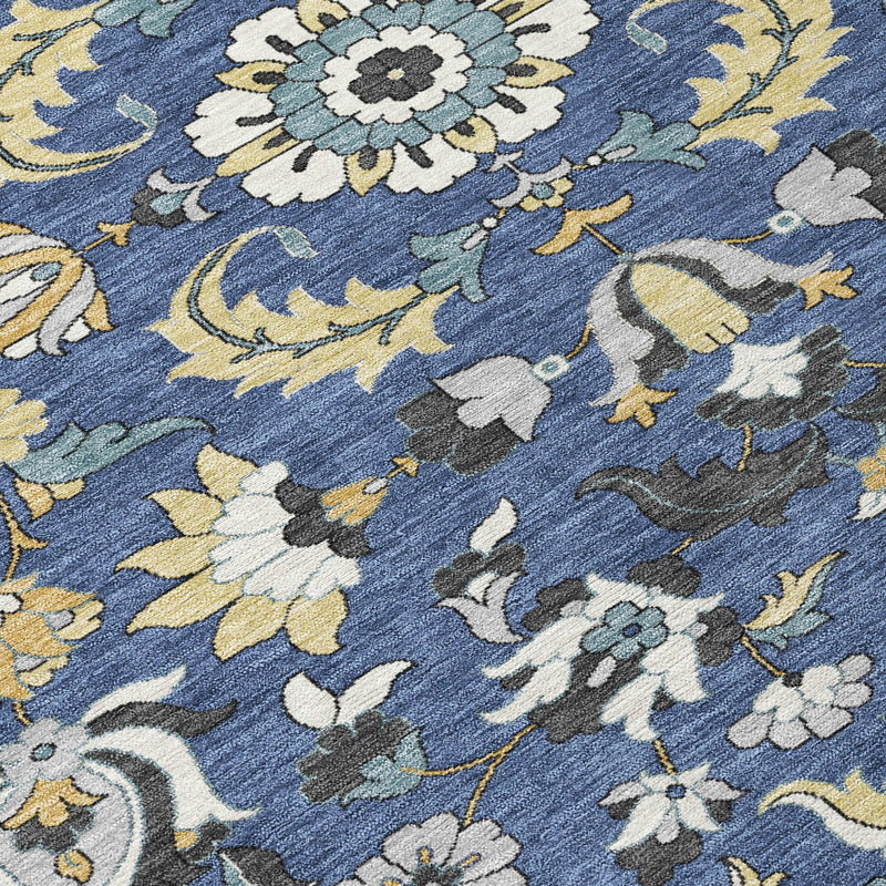 Navy blue floral rug corner detail with wheat, white, and gray blossoms
