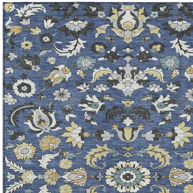 Navy blue floral medallion area rug with wheat, white, and gray decorative scrollwork