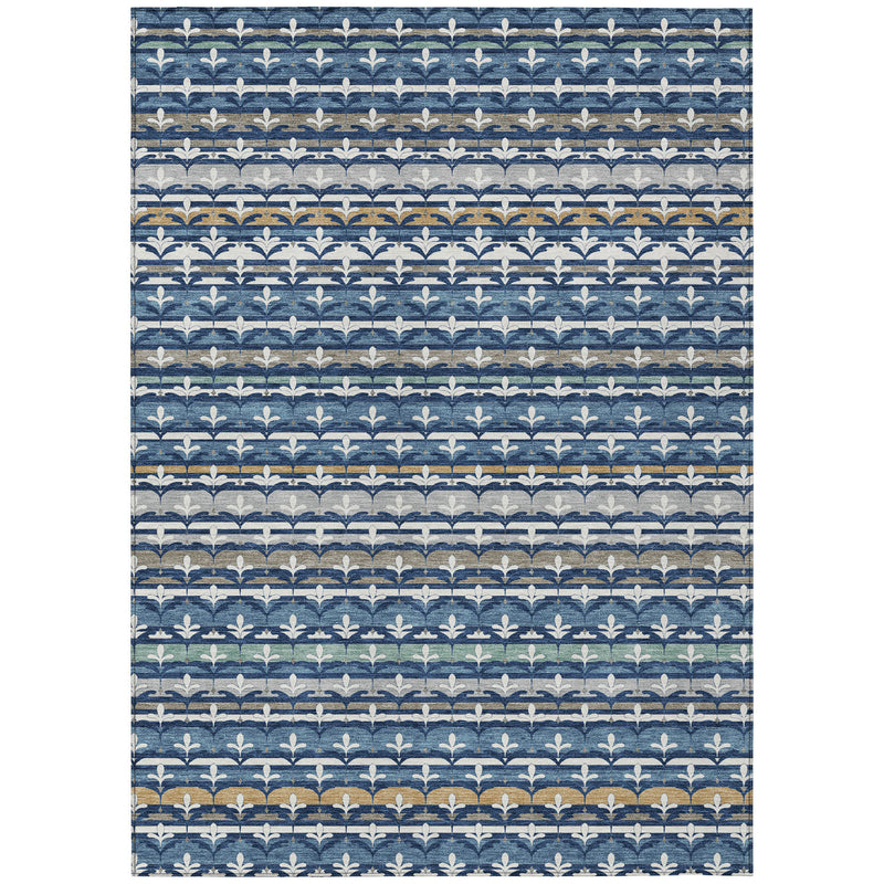 Navy and blue area rug with striped damask motif in white and gold accents