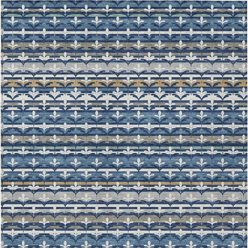 Straight-on view of navy blue area rug with repeating fleur-de-lis damask stripe pattern