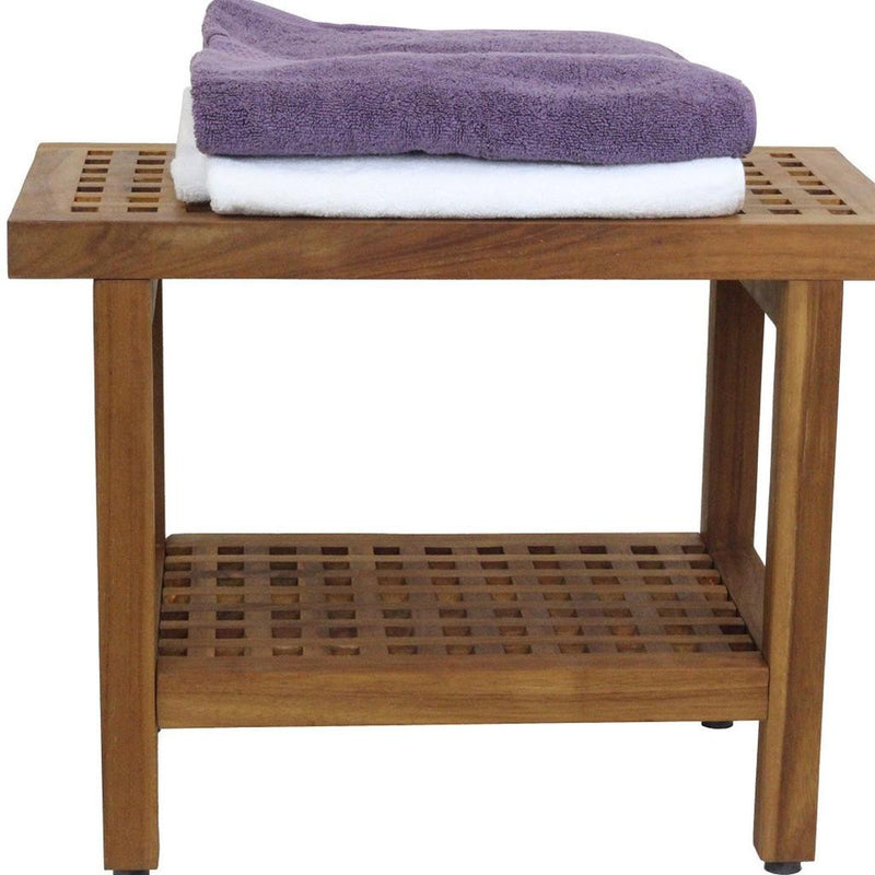 Brown teak shower bench with slatted top and lower shelf, with rolled towel