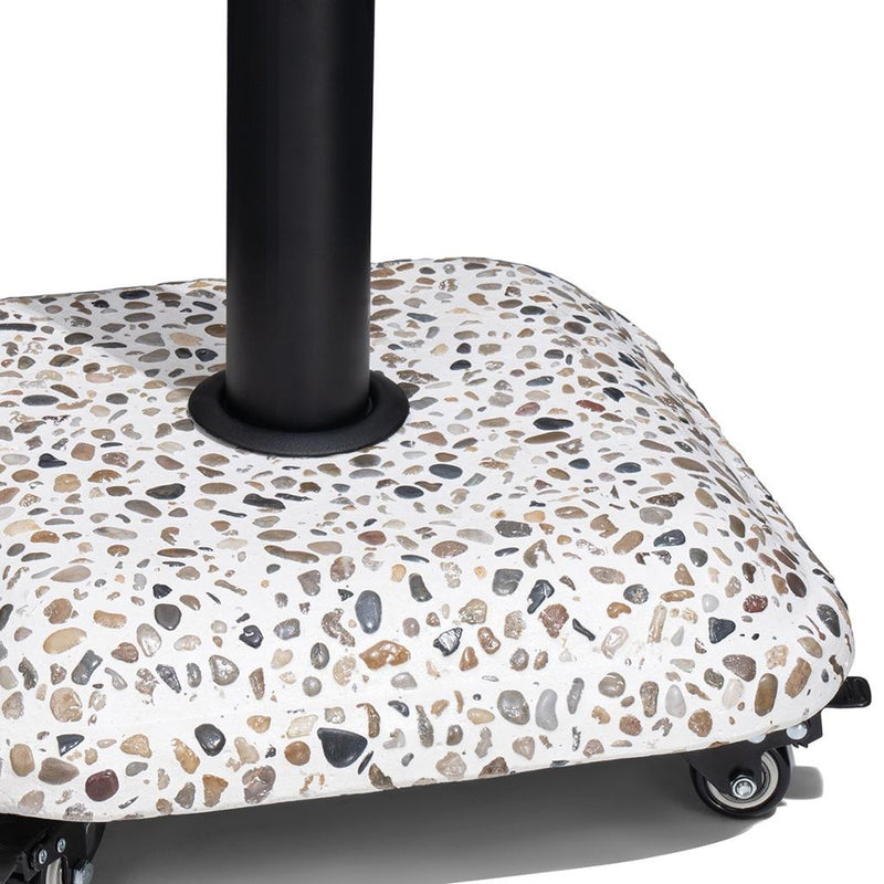 Speckled umbrella base cover with black pole base and caster wheels