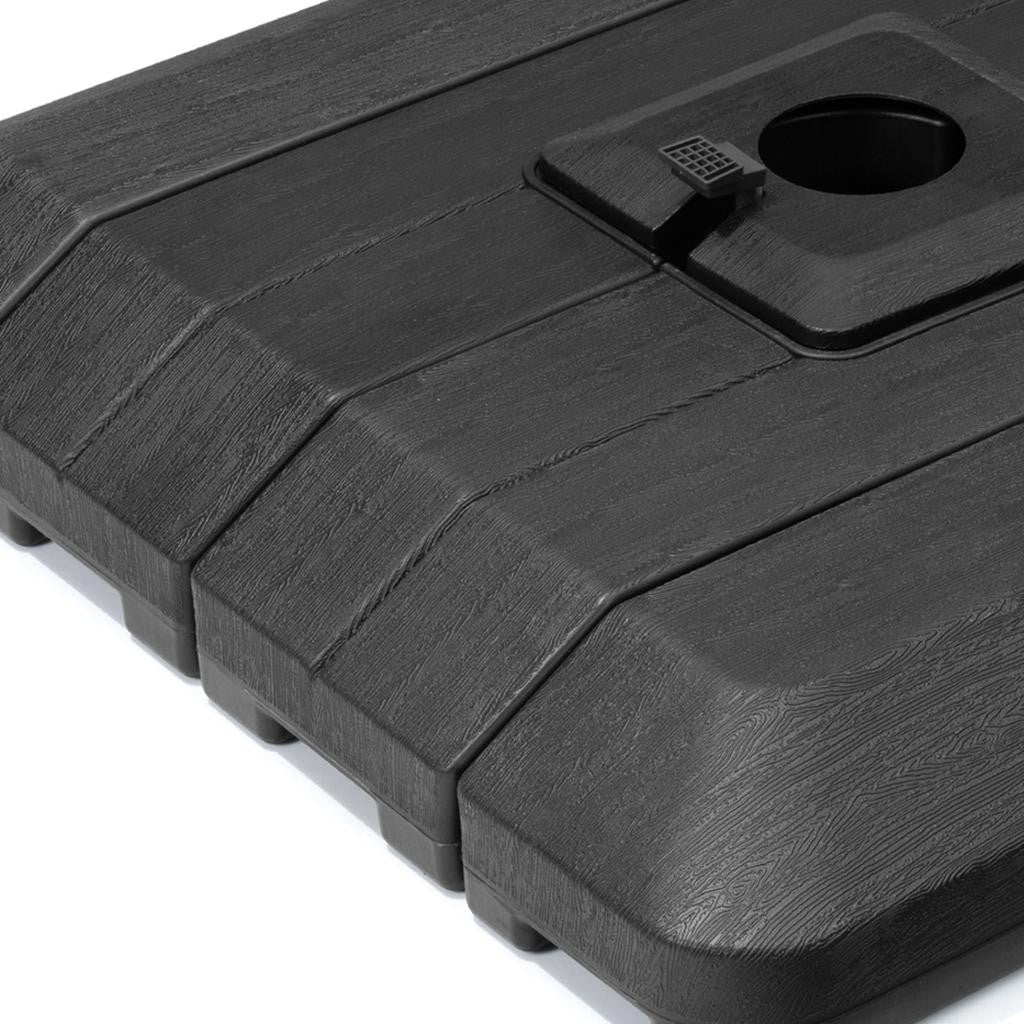 Black umbrella base with textured surface and central round pole hole
