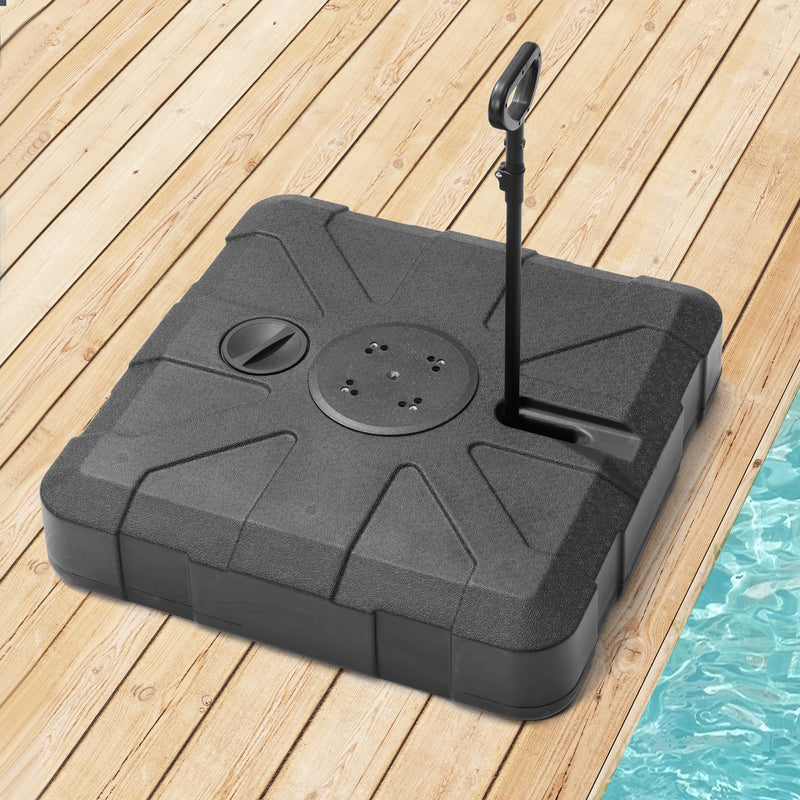 Black in-ground umbrella base with umbrella pole stand and fillable top panel