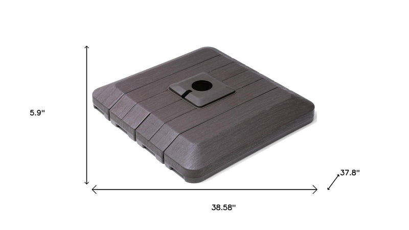 Square fillable umbrella base with central hole and lever notch, dark gray