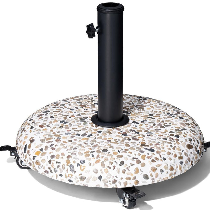 Round umbrella base with speckled stone cover, tall black pole, and adjustable clamps