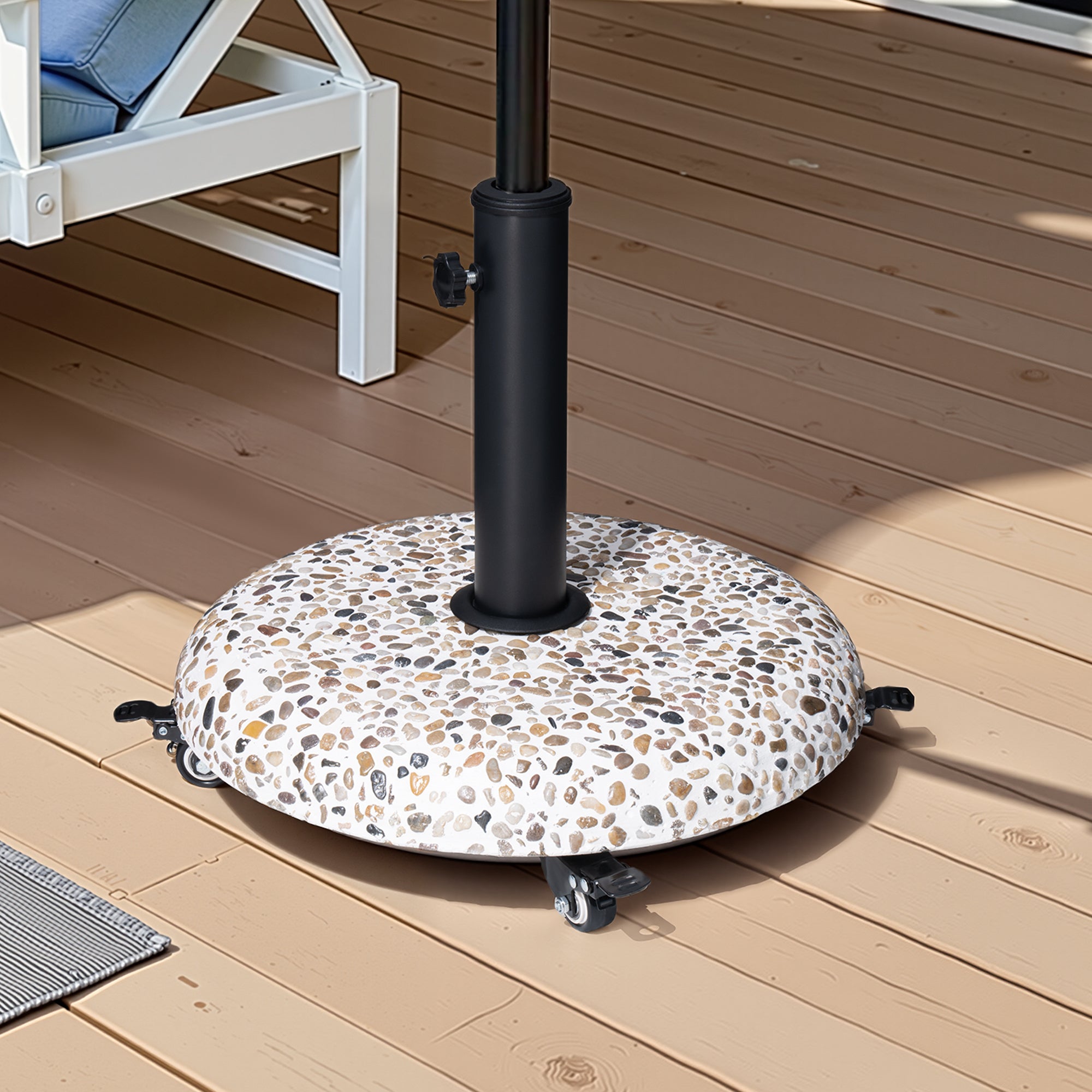 Speckled stone-pattern umbrella base with black pole and caster-like support feet