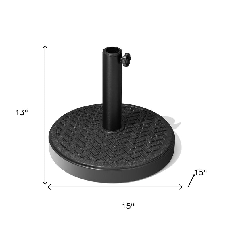 Black in-ground umbrella base with 13 in height and 15 in round footprint